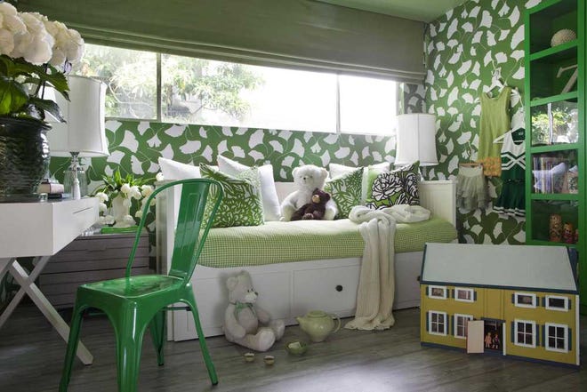 With minimal effort and expense, you can live year-round with a bit of the charm and feeling of a favorite travel destinations. This bedroom of a tween cheerleader, designed by Brian Patrick Flynn, shows his use of the kelly green fabric of her cheerleading camp uniform as inspiration.