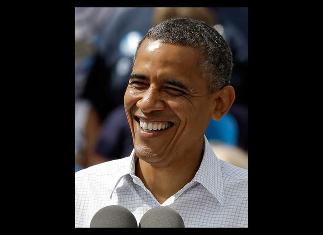 President Obama smiles at supporters during a campaign rally Saturday, Sept. 8, 2012, in Seminole, Fla. (AP Photo/Chris O'Meara)