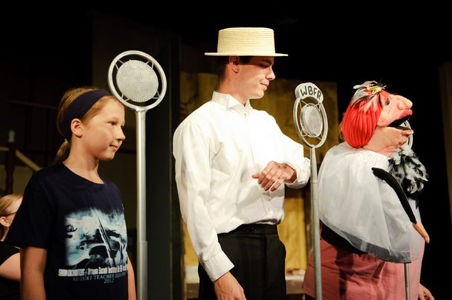 From left, Hope Keithahn, Julian Foley and Dianna Long act out a scene during a Sept. 4 rehearsal of “Anne,” performed by the Columbia Entertainment Company and PACE Youth Theatre Company.