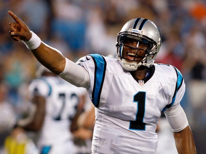 Carolina Panthers quarterback Cam Newton is coming off a spectacular season in which he set a record for yards passing in a season by a rookie and rushing touchdowns by a quarterback.