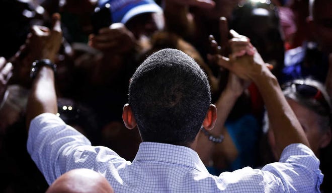 President Barack Obama greets supporters at a campaign event at Kissimmee Civic Center on Saturday in Kissimmee, Fla.