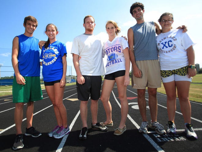 Mainland cross country is a family affair for brother and sister sets, Cody and Mikaela Ham, left, Casey and Christina Ladurini, center, and Tommy and Rosalie Morrissey.