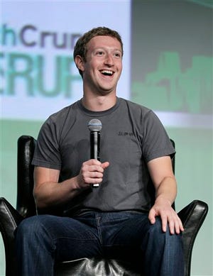 Facebook CEO Mark Zuckerberg speaks during a "fireside chat" at a conference organized by technology blog TechCrunch in San Francisco, Tuesday, Sept. 11, 2012. Zuckerberg gave his first interview since the company's rocky initial public offering in May. (AP Photo/Eric Risberg)