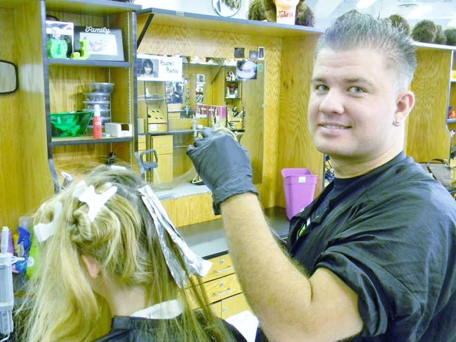 Jordan Drury works with a customer in the FCTC cosmetology department. Contributed photo