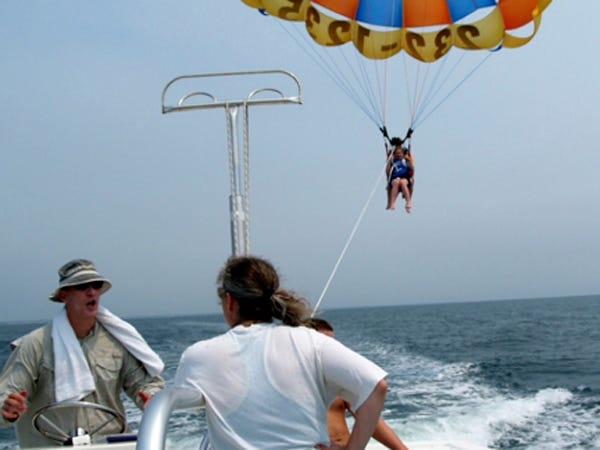 Jay Dalton (left) is owner of Wrightsville Parasail. Contributed photo