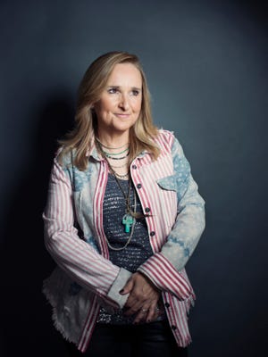 This Sept. 4, 2012 photo shows American singer-songwriter Melissa Etheridge in New York. The Grammy Award-winning singer-songwriter, whose 12th studio album has been released on Tuesday, challenged herself to play all the guitar parts this time around for the first time.