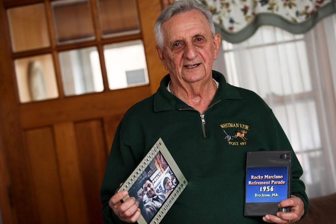 Richard Mahoney of Brockton holds a digital print, and a DVD of what was originally a home video shot on 8mm film. The short movie is of Rocky Marciano's retirement parade in 1956 and the color footage of the late champion is considered quite rare.