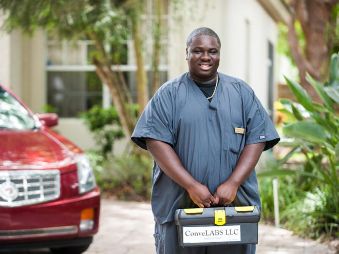 Nicodemme Baptiste, a phlebotomist with ConveLabs LLC, outside a client's home in Sarasota. ConveLabs LLC is a mobile phlebotomy company that provides lab services by certified phlebotomy technicians at a patient's home, job or their doctor's office.