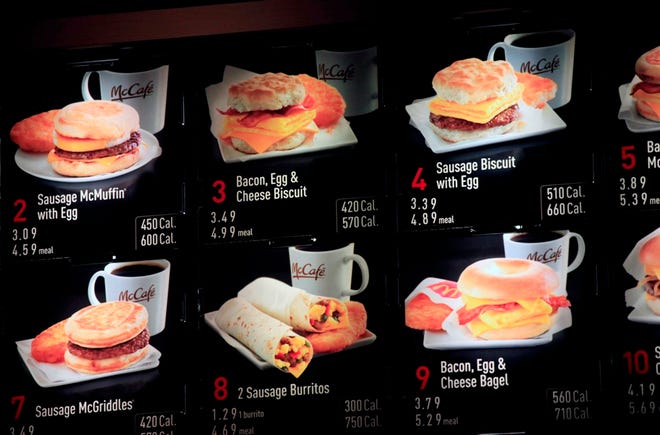Items on the breakfast menu, including the calories, are posted at a McDonald’s restaurant in New York. (The Associated Press)