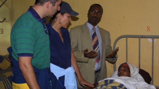 Donna and Philip Berber tour a hospital in Dembi Dollo, Ethiopia, in 2001. They wanted to make a meaningful impact on the country and started with this village, where a staff member was born.