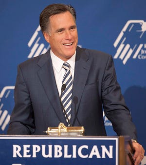 In this April 2, 2011, file photo, former Massachusetts Gov. Mitt Romney speaks at the Republican Jewish Coalition annual leadership meeting in Las Vegas. On Monday, Romney announced his presidential bid, saying it's time to restore America greatness. (AP Photo/Julie Jacobson, File)