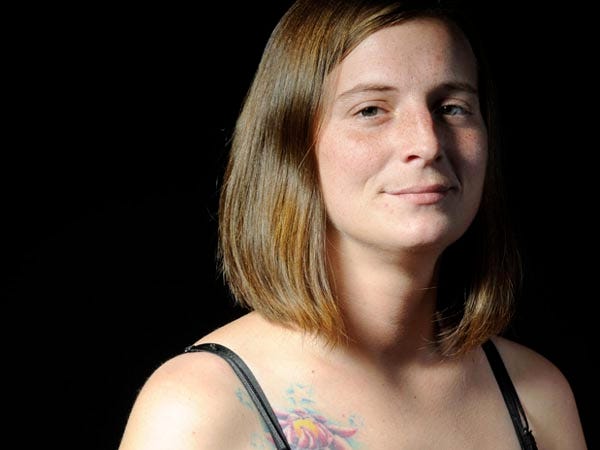 Amber Spivey, a 28-year-old freckled mother of three, is recovering from drug addiction.
