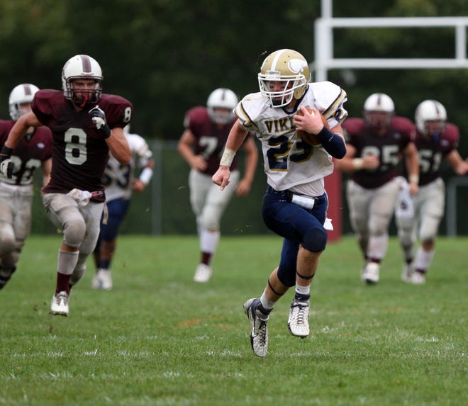 East Bridgewater's Willie Venckus runs with the ball during the Vikings' 46-12 football victory over Bishop Stang on Saturday.