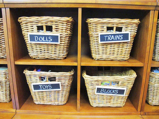 A place for everything: And everything in its place. Even kids can learn to get and stay organized when you have a system. These baskets have chalkboard labels that you can erase as contents change. Photo courtesy of Mark Brunetz.
