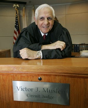 Fifth Judicial Circuit Court Judge Victor Musleh poses in his courtroom at the Marion County Courthouse in Ocala.