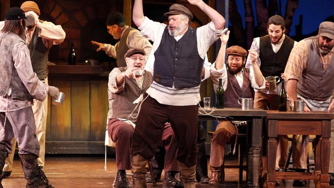 For Harvey Fierstein, center, the character Tevye embodies modernity. 'Shtetl life is death,' the actor says. 'Many who left didn't make it, either. Tevye survived somehow. He moved into modern life. You watch him bend and bend and bend.'