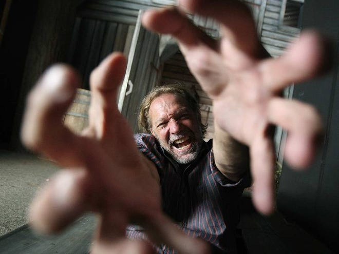 Greg Nicotero, the movie-makeup master and co-executive producer of the AMC series “The Walking Dead,” is inside the maze “The Walking Dead: Dead Inside” at Universal Studios Hollywood. The maze is this year's centerpiece for Universal's Halloween Horror Nights.