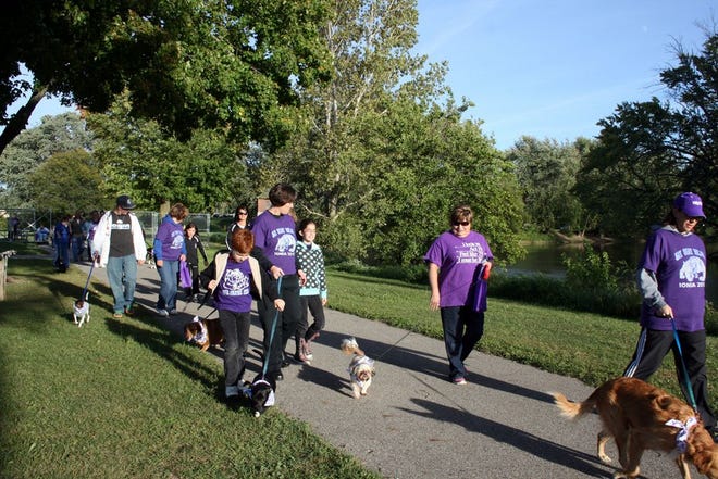 Happy Tails Walk of Hope was a success Monday as about 20 dogs and their owners took to the rail trail at the Ionia Free Fair grounds in order to support Community Awareness Week.