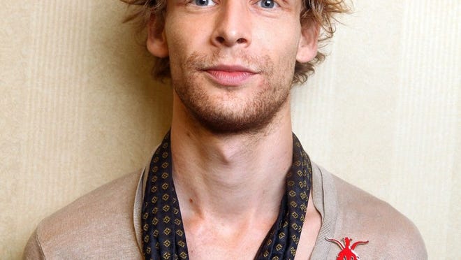 Authorities say Actor Johnny Lewis fell to his death after killing an elderly Los Angeles woman. He appeared in the FX television show “Sons of Anarchy,” for two seasons.