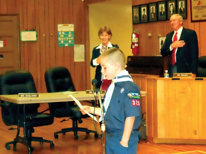 Eli Roth, a third-grader at Woodland Elementary School and a member of Boy Scout Troop 328, led the Pledge of Allegiance and sang the National Anthem prior to Monday night's meeting of the Oak Ridge Board of Education.