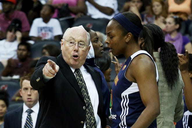 Connecticut Sun head coach Mike Thibault, left, speaks to Sun guard Danielle McCray during a WNBA basketball game against the New York Liberty at the Prudential Center, Thursday, Aug. 16, 2012, in Newark, N.J. ()
