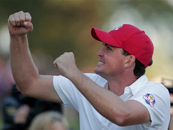 USA's Keegan Bradley reacts on the 17th hole after winning a four-ball match 2&1 at the Ryder Cup PGA golf tournament on Friday, at the Medinah Country Club in Medinah, Ill. (AP Photo/Charlie Riedel)
