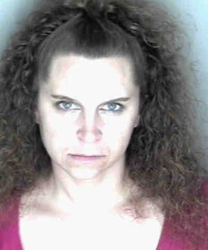 Lynn Smith, 40, is accused of using an 80-year-old woman's credit card without her permission.