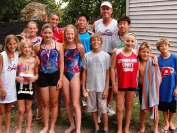 PSC Stingrays swimmers ages 12 and younger took part in the Newtown Aqua Pentathlon. They include (front row, from left) Julia Goroshko, Erin Shema, Hannah Soisson, Emily Herstine, Stuart Sumner, Nicole McDermott, Quinn Collins and Kevin McDermott. In the second row are Sara Collins, Maggie Heigel, Daniel Hahn, head coach Sean Kelly and Brian Lee.