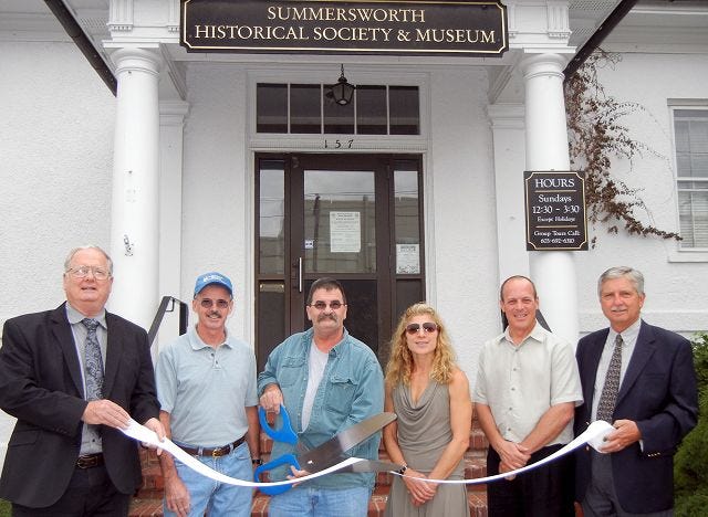 Courtesy photo
There was a ribbon cutting to commemorate the 10th anniversary of the Summersworth Museum. From left are: Chamber Board Chair Paul Edgar of Tri-City Christian Academy; Summersworth Museum Trustees Frank Kennedy and George Poulin; Development Manager for Somersworth Christine Davis; Chamber Board Member Peter Juneau of Waste Management; and City Manager Bob Belmore.