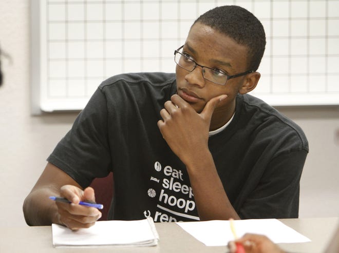 Freshman Blair Smith takes notes during math class at Oklahoma City Community College in June. Photo By David McDaniel, The Oklahoman ARCHIVES