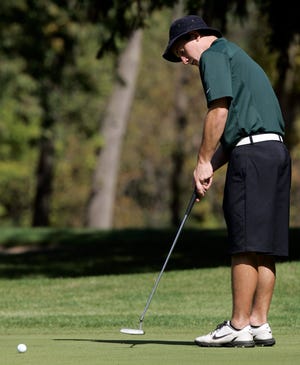 Boylan's Danny Gorman putts on the eighth green Saturday, Sept. 29, 2012, during the second day of play in the NIC-10 boys golf tournament at Sandy Hollow Golf Course in Rockford.