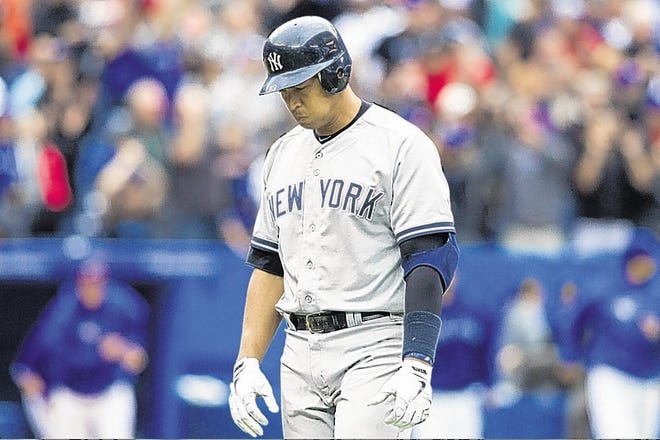 Yankees’ Alex Rodriguez reacts after he flied out to center during the ninth inning Saturday’s loss to the Toronto Blue Jays, a game that saw the Bombers go 2-for-11 with runners in scoring position.