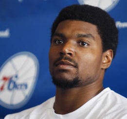 Philadelphia 76ers center Andrew Bynum listens to a question at his introductory news conference in August. (AP Photo/Brynn Anderson)