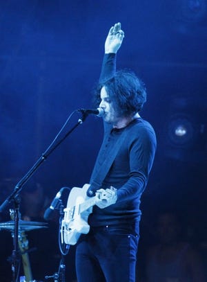 Jack White performs at Lollapalooza in Chicago's Grant Park on Sunday, Aug. 5, 2012. (Photo by Sitthixay Ditthavong/Invision/AP)