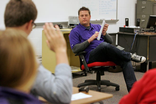 James Sabathne reviews a test with students in an Advanced Placement U.S. History class Friday, Sept. 28, 2012, at Hononegah High School.