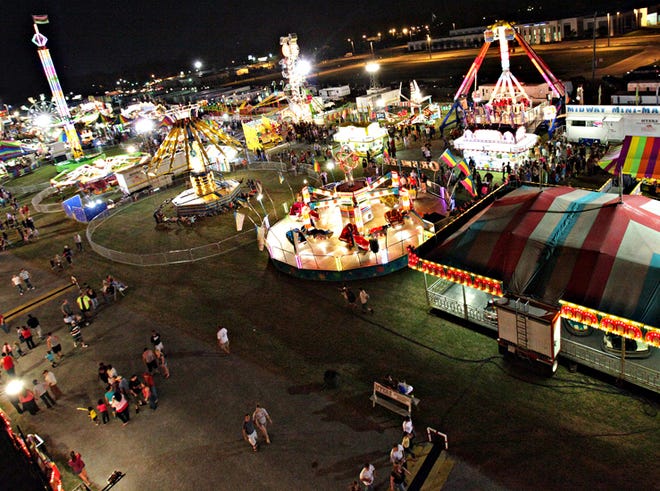 The grounds of the Panama City Central Panhandle Fair filled with people Tuesday night.