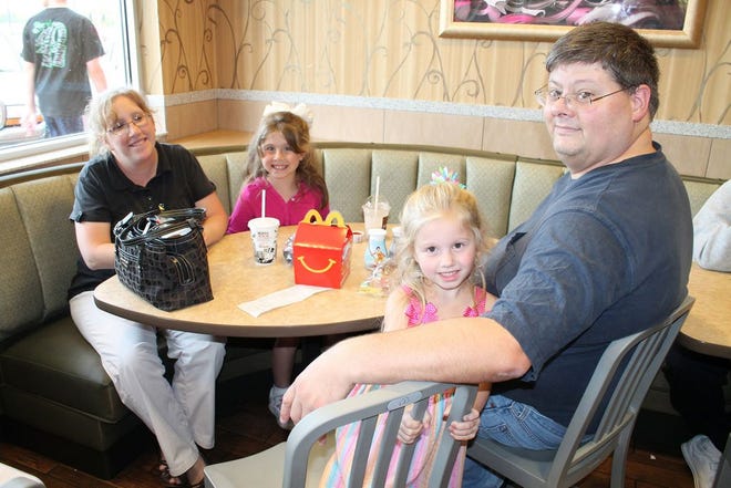 The Forney family, from left, Lisa, Samantha, Zoe and Clint attended the McDonalds IVCEF Benefit Sept. 26. Samantha Forney is in the second grade at Mossville School.