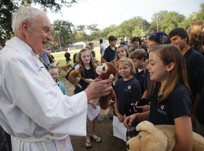PANAMA CITY — A local school had a yard full of animals — and a few of stuffed toys— Wednesday morning, as owners sought blessings for their pets.