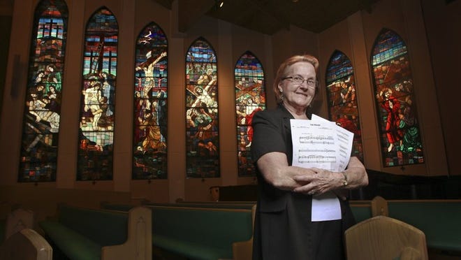 Doris Whidden has been the staff organist at Holy Name of Jesus parish in West Palm Beach for 52 years. She not only plays for two for two masses on Saturday and four on Sunday morning, Whidden also plays for weddings and funerals and is at church every Wednesday night to practice with the choir. (Damon Higgins/The Palm Beach Post)