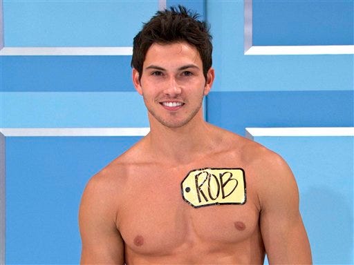 This undated image from video shows Rob Wilson, of Boston, who was chosen in an online competition to be the first male model on the popular daytime game show, "The Price is Right." Wilson begins his week-long stint alongside the ladies on Oct. 15. Hosted by Drew Carey, "The Price Is Right" airs weekdays at 10 a.m.
