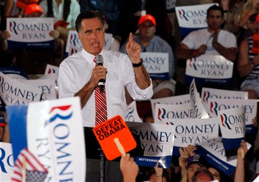 Republican presidential candidate Mitt Romney, gestures during a rally Thursday in Fishersville, Va.