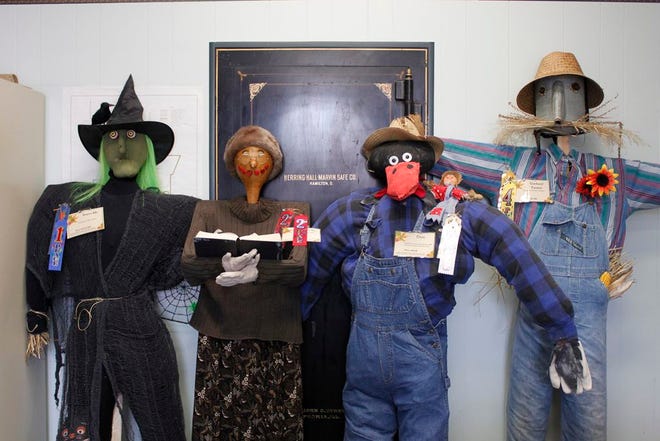 These scarecrows were judged best in Lewistown's first Scarecrow Contest. From left, the first place scarecrow is labeled “Scares Me” and was submitted by Minda Havens; “Marion the Librarian” by Lewistown Library took second place honors; “Crow” by Connie Henderson at Room by Room Country Store placed third place; and fouth place recognition went to “Gardener/Farmer” by Barbara Simpson.