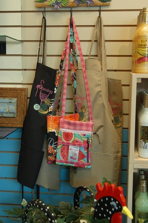 Alexander and Boudreau sell a wide variety of gifts - everything from aprons and purses to hot sauce and Mason Jar wine glasses.