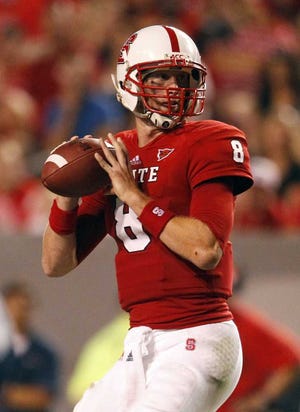 North Carolina State quarterback Mike Glennon (8) looks to pass during the second half of N.C. State's 31-7 victory over South Alabama on Saturday, September 15, 2012, at Carter-Finley Stadium in Raleigh, North Carolina. (Ethan Hyman/Raleigh News & Observer/MCT)