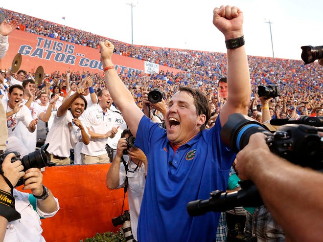 Florida head coach Will Mushamp celebrates after the team's 14-6 win over LSU at Ben Hill Griffin Stadium in Gainesville on Saturday.