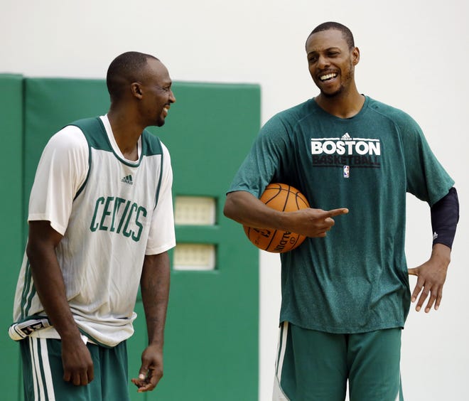 Paul Pierce, right, jokes with teammate Jason Terry during the Celtics' practice on Sunday in Waltham.