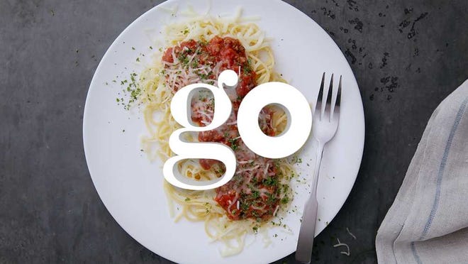 The video frame grab provided by Olive Garden shows a still from the Italian chain restaurant's new ad. After 14 years, the restaurant chain is abandoning its "When You're Here, You're Family" tagline as it looks to freshen up its image and boost struggling sales. Instead of evoking Old World charm, the new "Go Olive Garden" ads airing Sunday night, Oct. 7, 2012 will feature brightly lit snapshots of modern life. (AP Photo/Olive Garden)