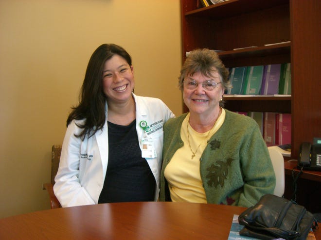 Dr. Sonia Seng, a medical oncologist and hematologist at the Southcoast Centers for Cancer Care at Charlton, is all smiles with Judith Gagliardi, who recently finished treatment for lung cancer six months ago and said staying close to home for treatment was important.