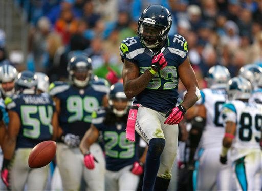 Seattle Seahawks' Brandon Browner (39) reacts after recovering a Carolina Panthers fumble during the third quarter of an NFL football game in Charlotte, N.C., Sunday, Oct. 7, 2012. (AP Photo/Bob Leverone)