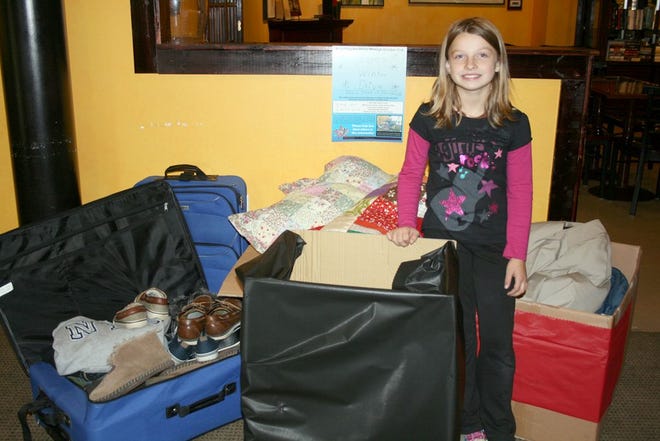 Zoe Hensley, 7, has put together “Zoe's Winter Drive” for the month of October. Her second drive this year, she is striving to collect food, bedding and warm clothing to benefit members of the community and those with the Straight Street Addiction Recovery Group. The drive lasts through October.